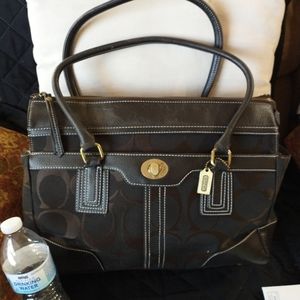 Dark brown signature Coach tote bag.  Large enough for laptop